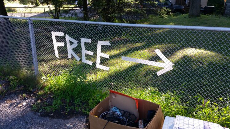 FREE sign on fence